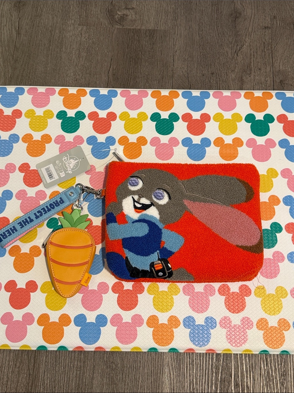 NWT** Disney Judy Hopps Carrot Charm Wrist Pouch